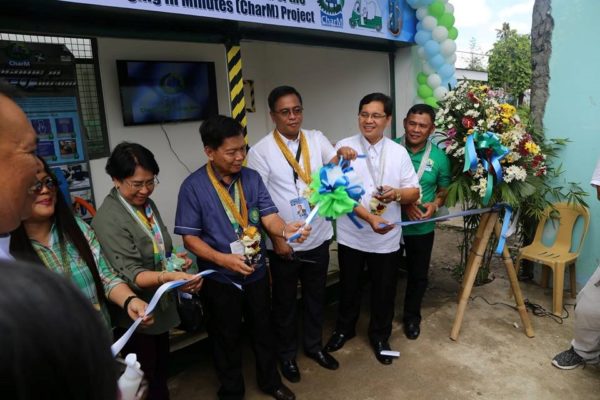 DOST 02 Director Sancho A. Mabborang (3R) leads the ribbon cutting of the CharM Station together with PSTC Isabela Provincial Director Marcelo G. Miguel (R), ISU President Ricmar P. Aquino (2R), ISU  Cauayan Executive Officer Precila C. Delima (L), ISU OIC President Emilia Martinez (2L) and LGU Cauayan City Administrator Jose Abad (3L) .